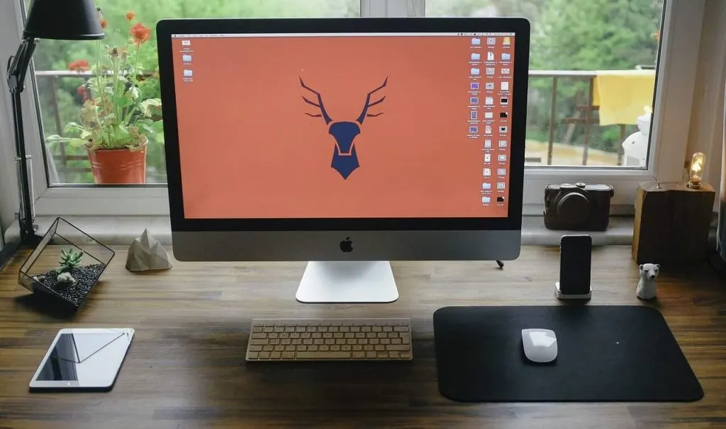 Apple computer in work from home setting