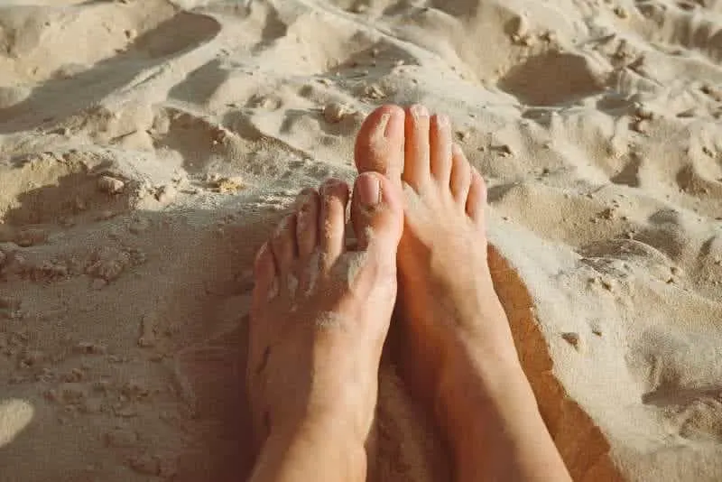 feet on the beach