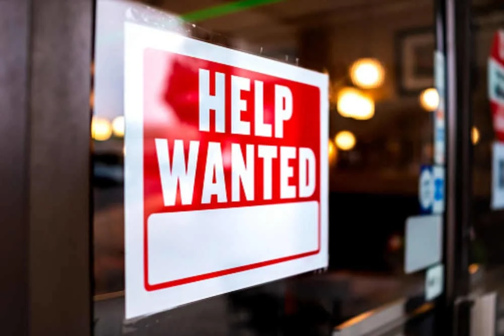 Help wanted sign on shop door