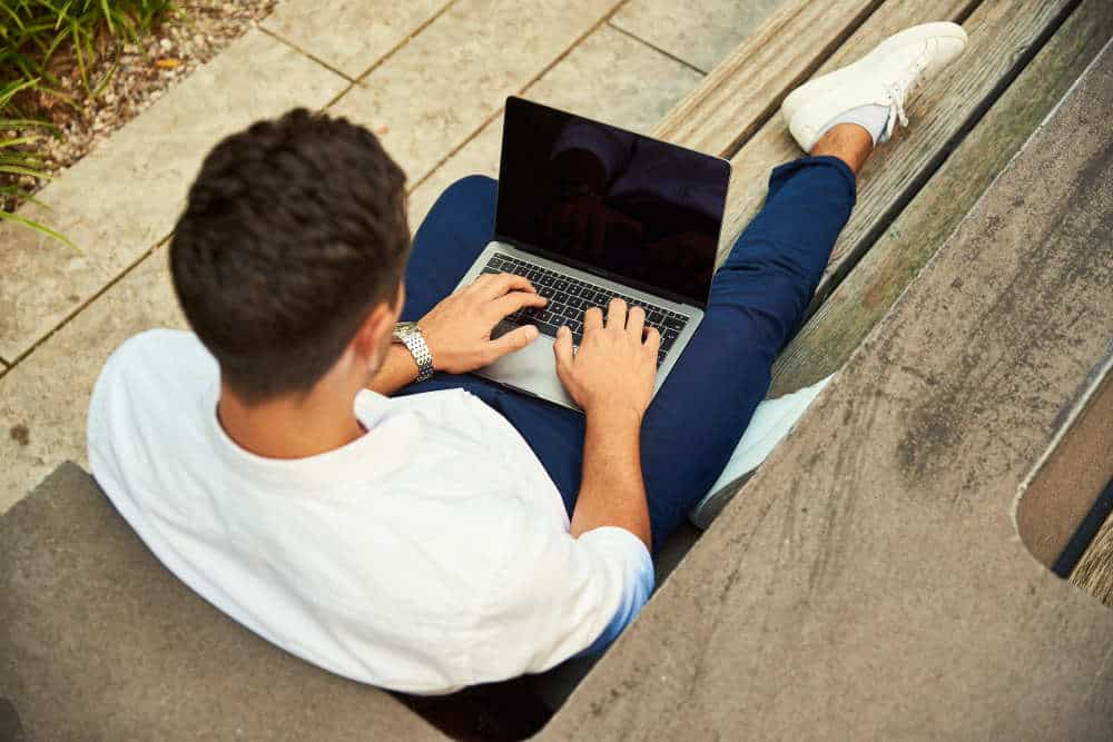 Man casually working with his laptop