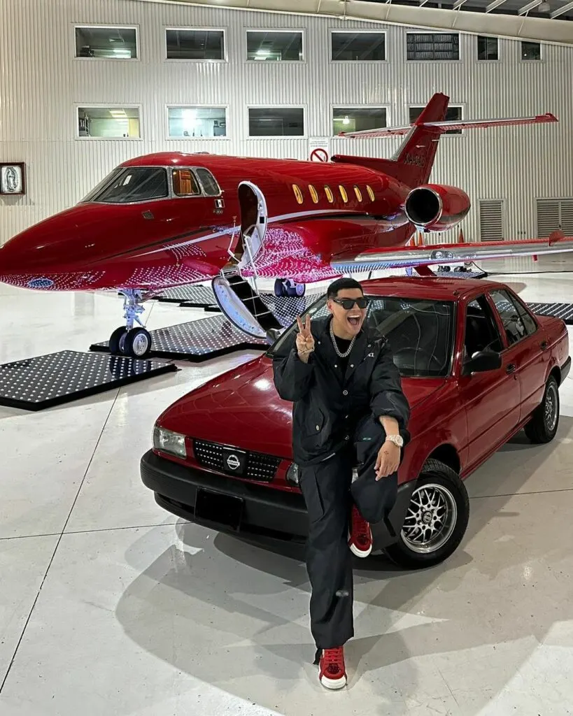 Eduin Caz in front of his jet
