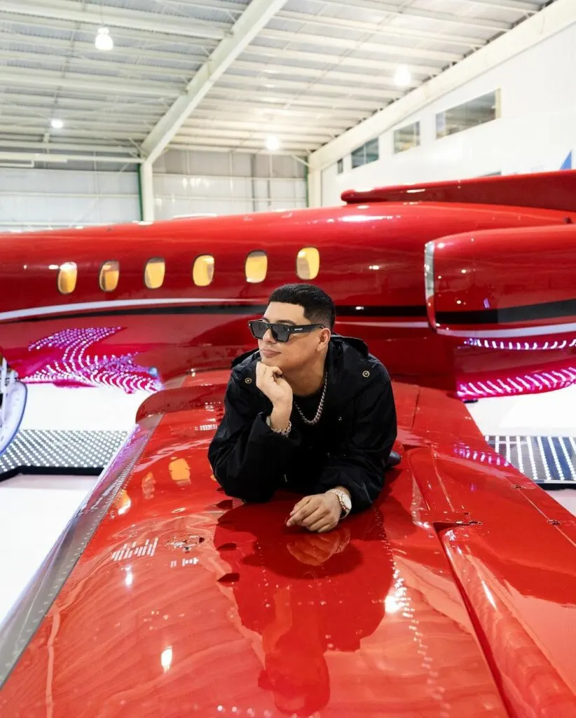 Eduin Caz onw the wing of his new jet