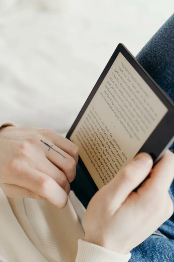Image by cottonbro studio via Pexels - Close-Up Shot of a Person Reading an Electronic Book